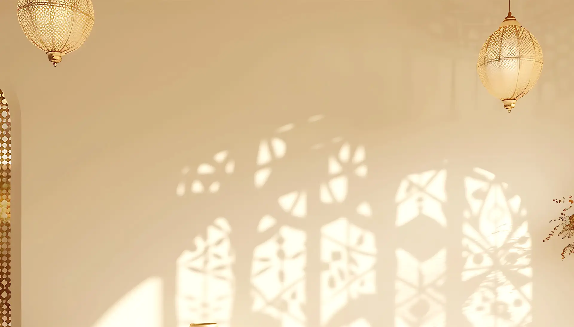 Warm lantern light falling across a patterned wall in the restaurant